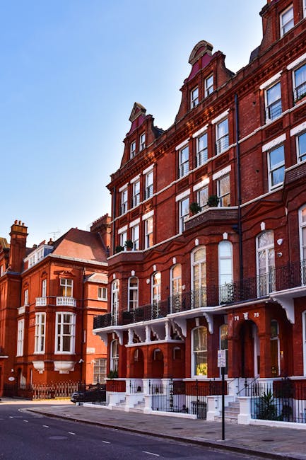 Image of a busy street scene on High Road Finchley during daytime, featuring a mix of Victorian and modern architecture. The street is paved with asphalt, showing painted road markings and a designated bus lane. A few pedestrians are walking along the sidewalks, which are lined with shops, cafes, and storefronts. The sky is partly cloudy with natural daylight illuminating the scene, reflecting a typical urban environment. The image emphasizes the vibrant, well-maintained appearance of the area, aligning with the context of residential and commercial surroundings related to high street cleaning and maintenance, as discussed on finchleycarpetcleaning.org.uk under the page about high road Finchley end of tenancy cleaning advice, although the image itself depicts an exterior street scene rather than indoor cleaning.